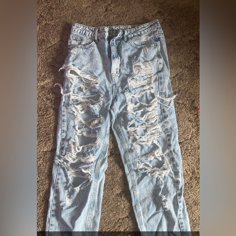 Distressed Light Blue Jeans